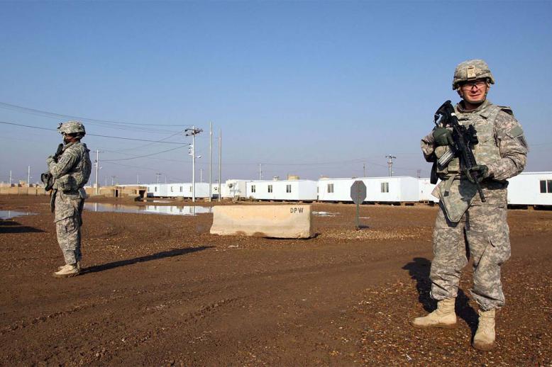 US soldiers walk around at the Taji base complex 