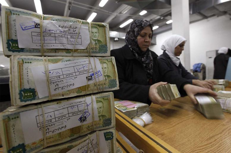 50,000 Syrian pounds, which is nearly $11 on the black market, will go to public sector workers