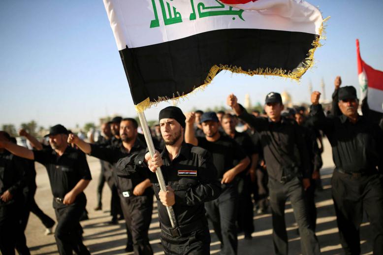 استعراض لجيش المهدي التابع لمقتدى الصدر في النجف