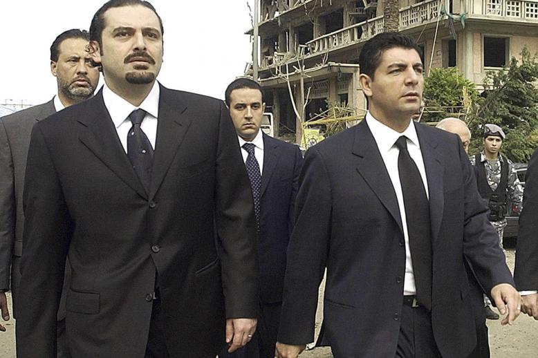 سعد وبهاء الحريري في موقع تفجير موكب ابيهم رفيق الحريري في بيروت