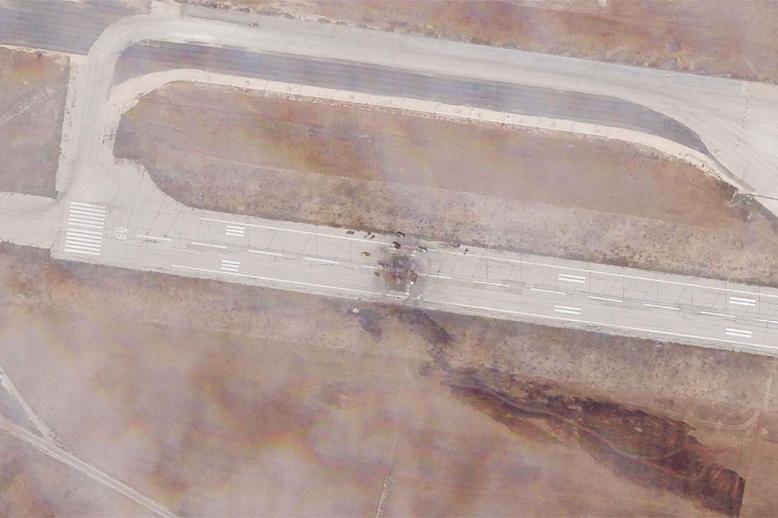 The runway damage after an Israeli strike targeted the Aleppo International Airport