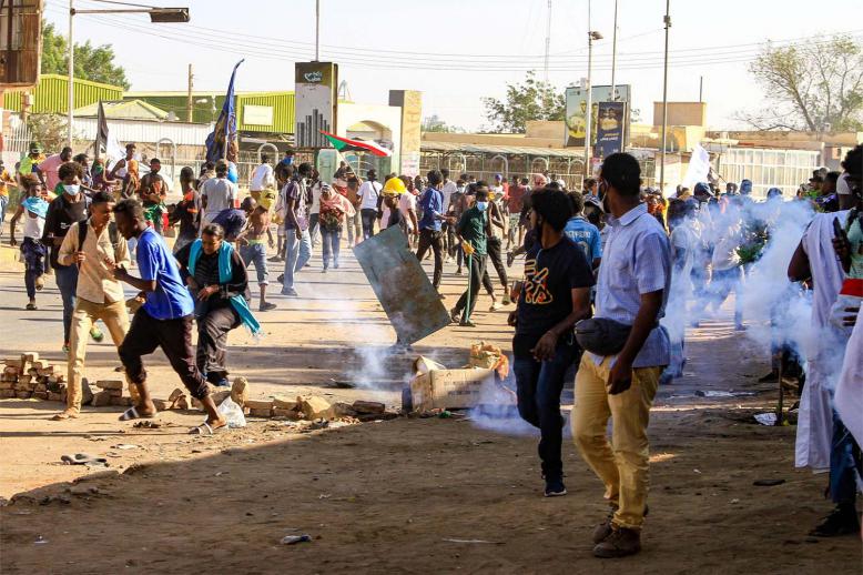Sudanse security forces fire tear gas on protesters during a protest calling for civilian rule on Nov. 30