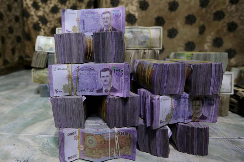 The Syrian pound had traded at 47 to the dollar before anti-Assad protests in March 2011