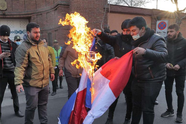Hundreds of protesters shouted “Death to France”