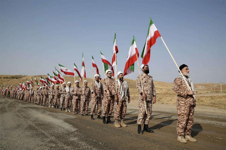 Britain says the sanctioned IRGC officials are responsible for managing the group's financial investments
