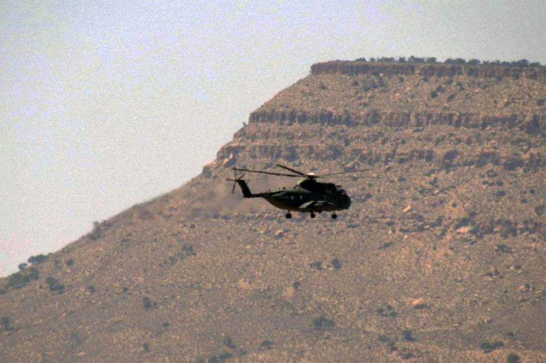 TThe defence ministry is searching land and sea areas to determine the helicopter's location