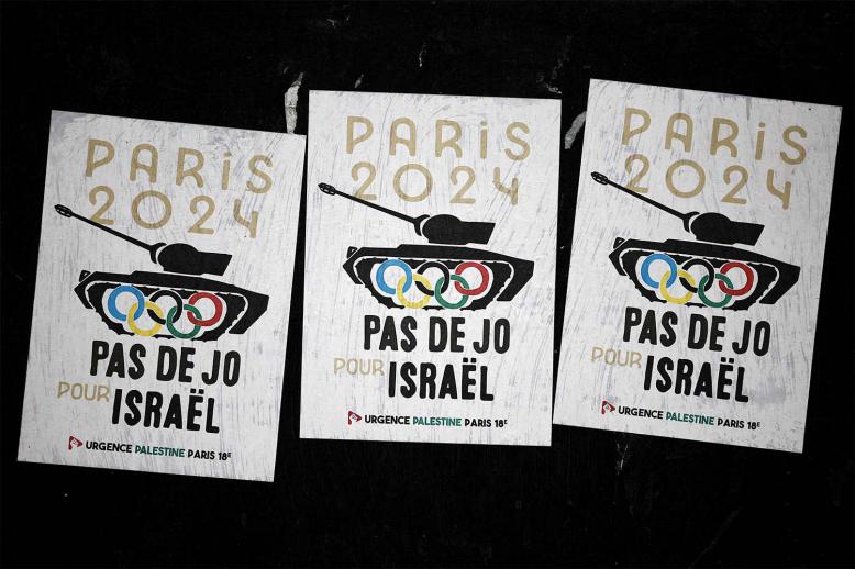 Posters saying No Olympics for Israel are pictured in the 18th arrondissement district in Paris