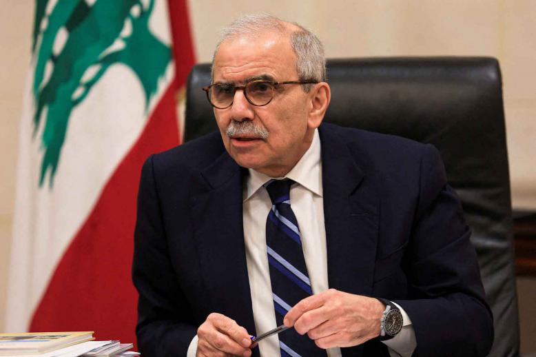 Lebanese Prime Minister Nawaf Salam speaks to journalists at the government headquarters in Beirut.
