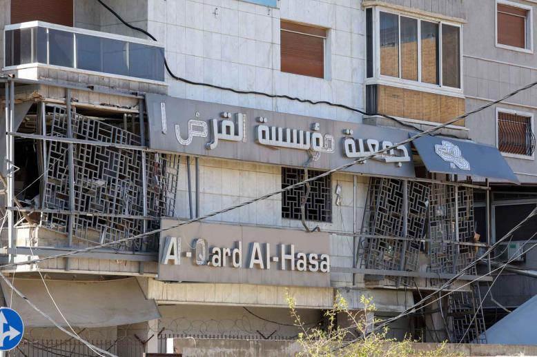 A view shows a damaged building which is a branch of Al-Qard al-Hassan, a financial institution linked to Lebanon’s Hezbollah, in the aftermath of Israeli airstrikes in Beirut suburbs, October 21, 2024. 