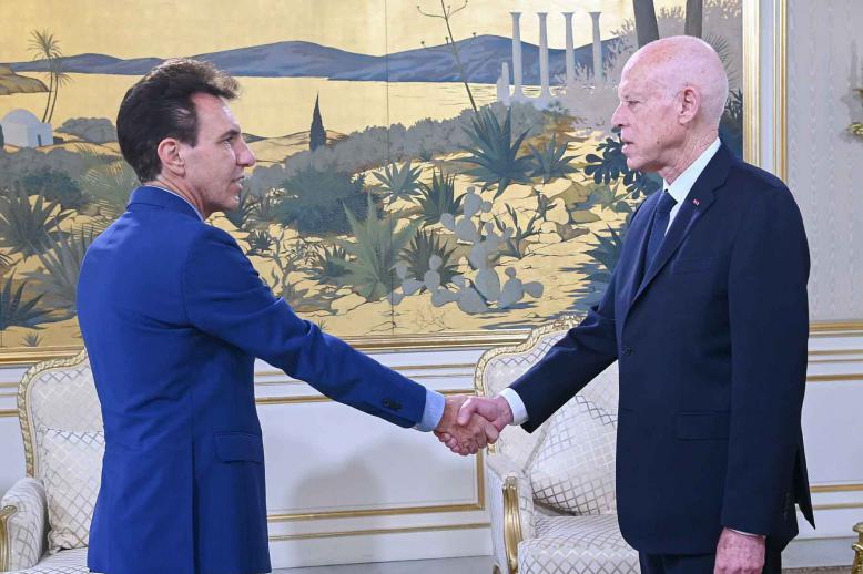 Tunisian President Kais Saied shakes hands with EU Ambassador Giuseppe Perrone at the Carthage Palace in Tunis, November 25, 2025.