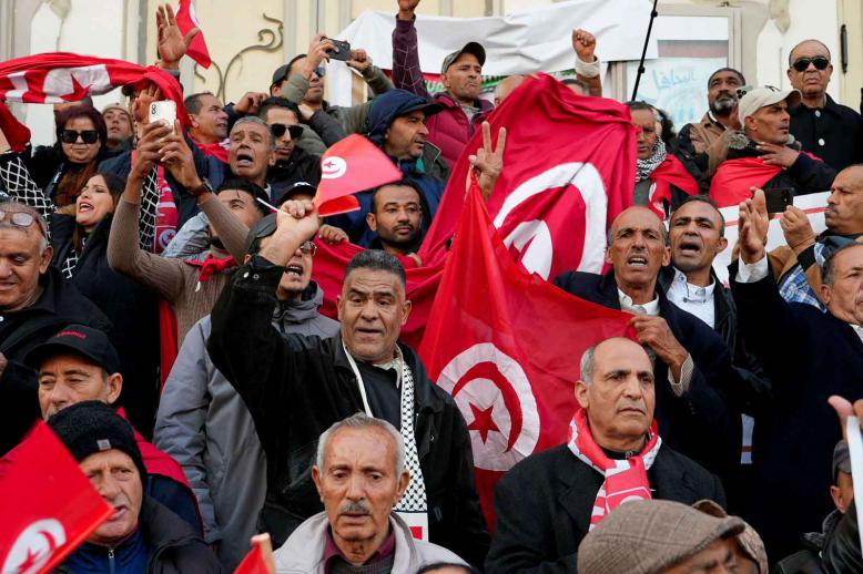 Supporters of Tunisian President Kais Saied rally in Tunis, December 17, 2025. 