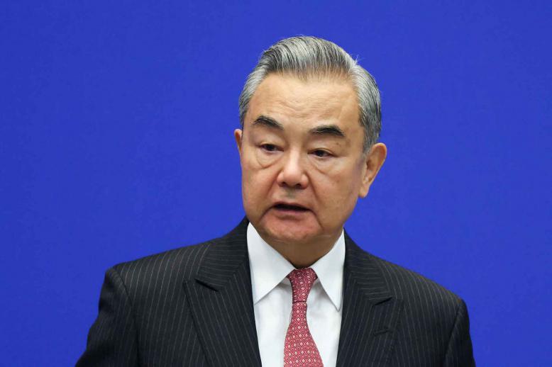 Chinese Foreign Minister Wang Yi speaks in Beijing, October 27, 2025. 