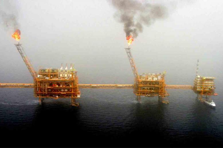  Gas flares from an oil production platform at the Soroush oil fields in the Persian Gulf, south of Tehran