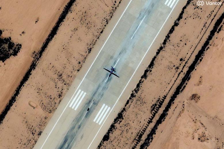 A satellite image shows a combat drone, which experts identified as most likely a Chinese-made Feilong-1, on the runway at Al Khadim airbase