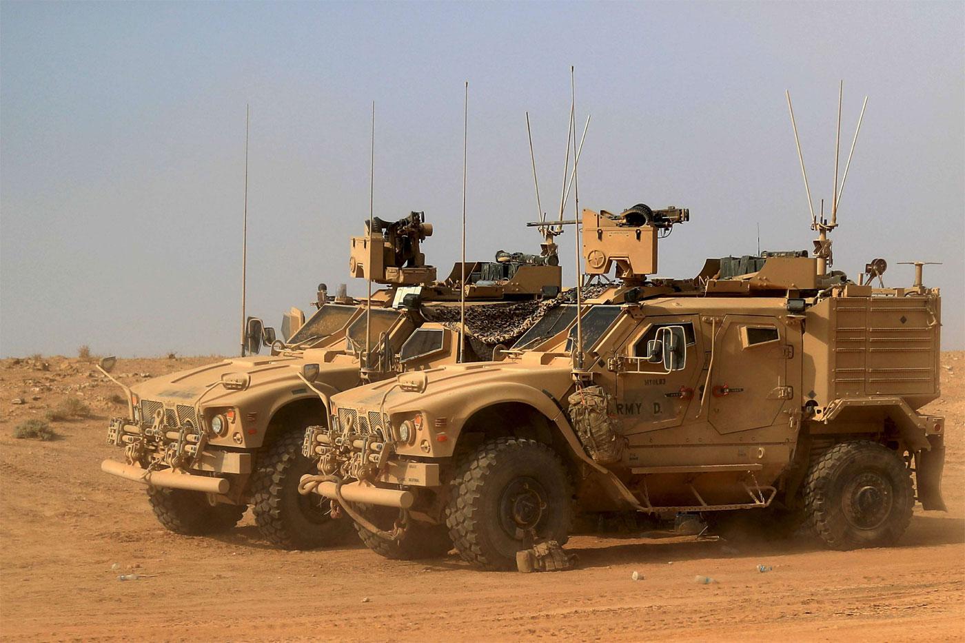The vehicles of US-backed forces are pictured near the village of Susah in the eastern province of Deir Ezzor