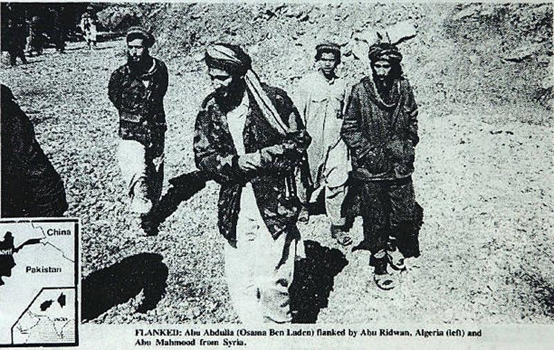 Enaam Arnaout, head of an Illinois Islamic charity, who was shown in the same Arab News report walking next to Bin Laden.