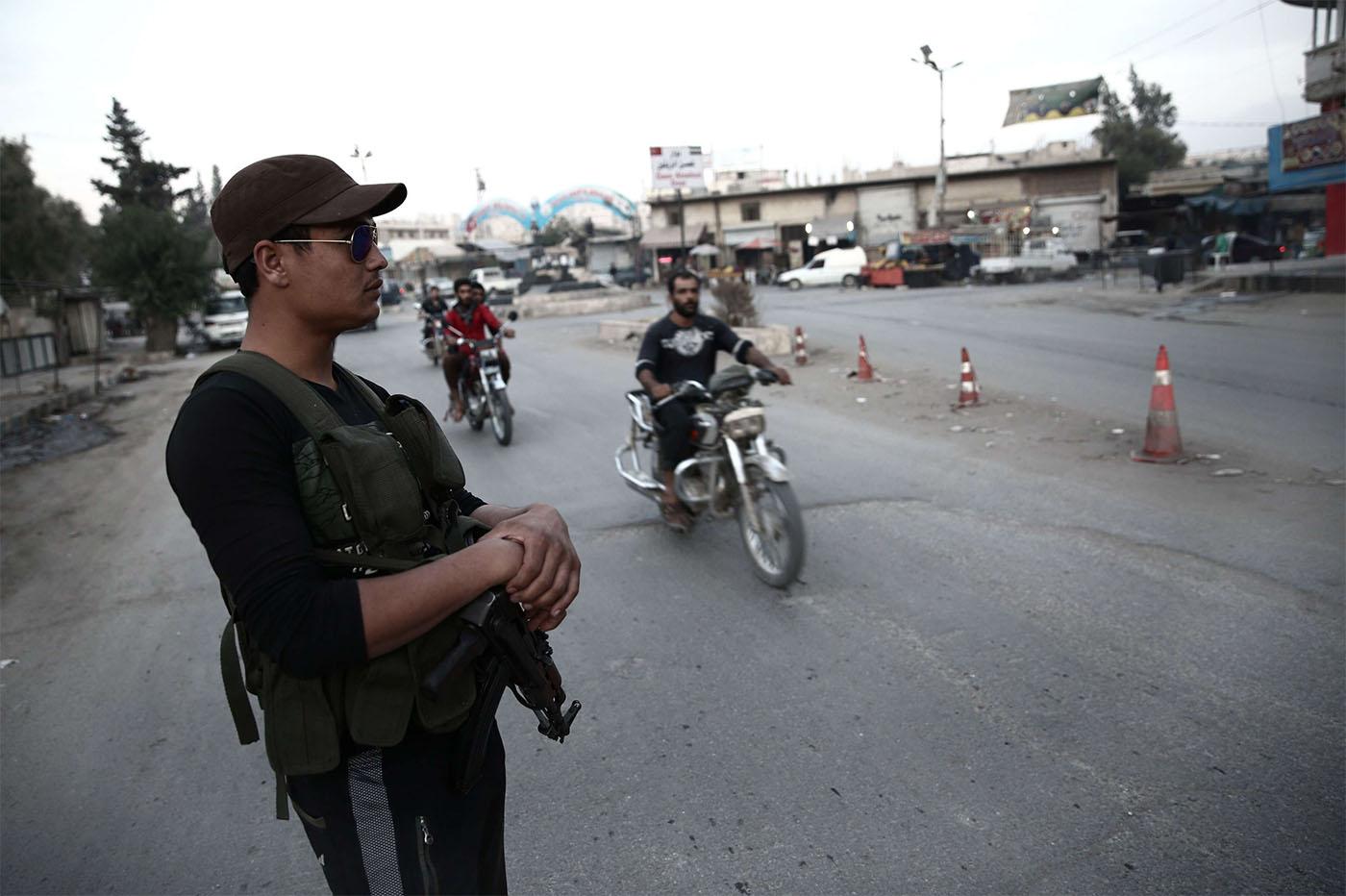 Turkish troops in Afrin imposed a curfew on civilians from Saturday evening in a bid to avoid bloodshed