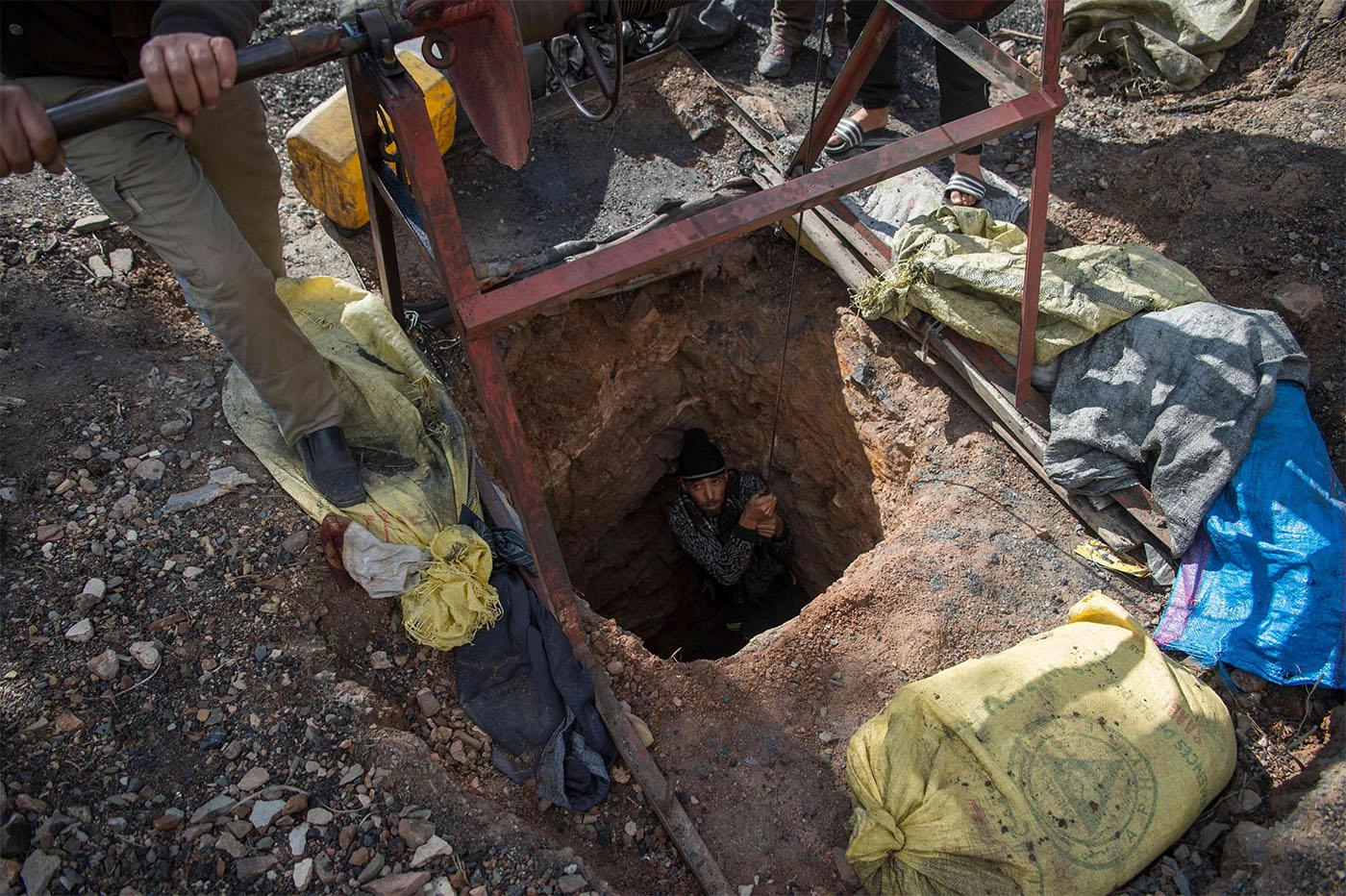 hundreds of people risk their lives every day to scrape a meagre living from perilous abandoned coal mines