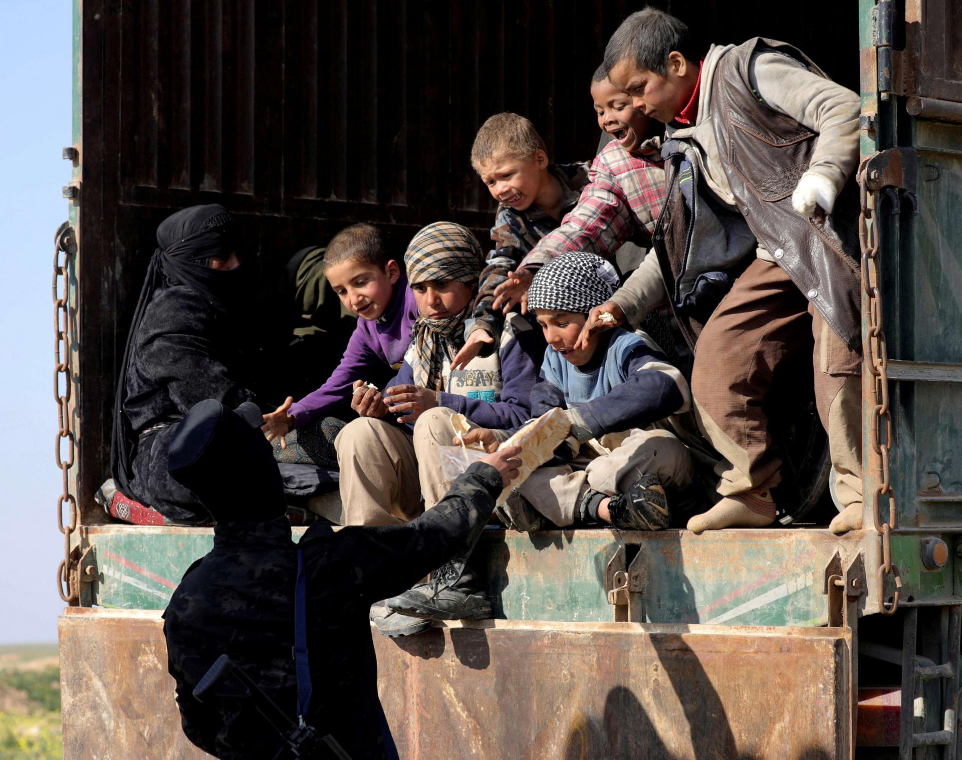 The Kurdish-led SDF evacuated nearly 5,000 men, women and children from the jihadist redoubt 