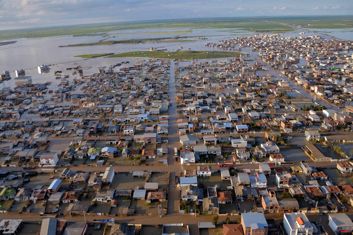 Photo taken on March 24, 2019 and released by the Iranian news agency Fars News, shows flooded streets in the northern Iranian village of Agh Ghaleh.