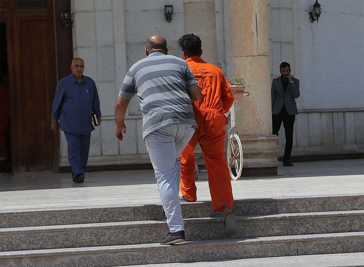 Iraq is conducting trials of thousands of suspected Islamic State fighters