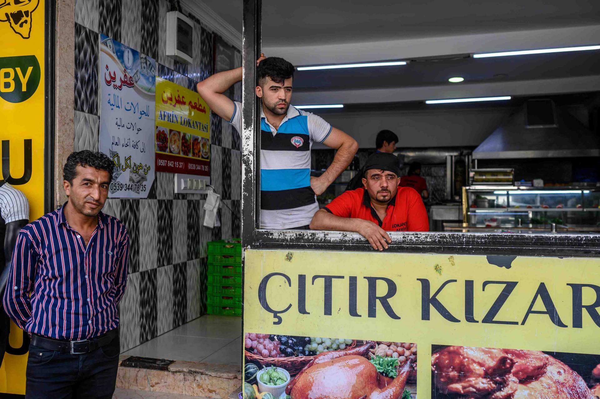 ISTANBUL - Ahmad Yassine was working in his barbershop in Istanbul's working-class district of Kucukcekmece when he saw an angry crowd gather. Then they attacked his business and others owned by Syrians. "They threw stones, the window was completely shattered. There was three of us inside, we were scared," the young man who fled from Aleppo six years ago said. "We were not able to leave before midnight, one in the morning," he added. The most recent violence against Syrians in Kucukcekmece 10 days ago has r