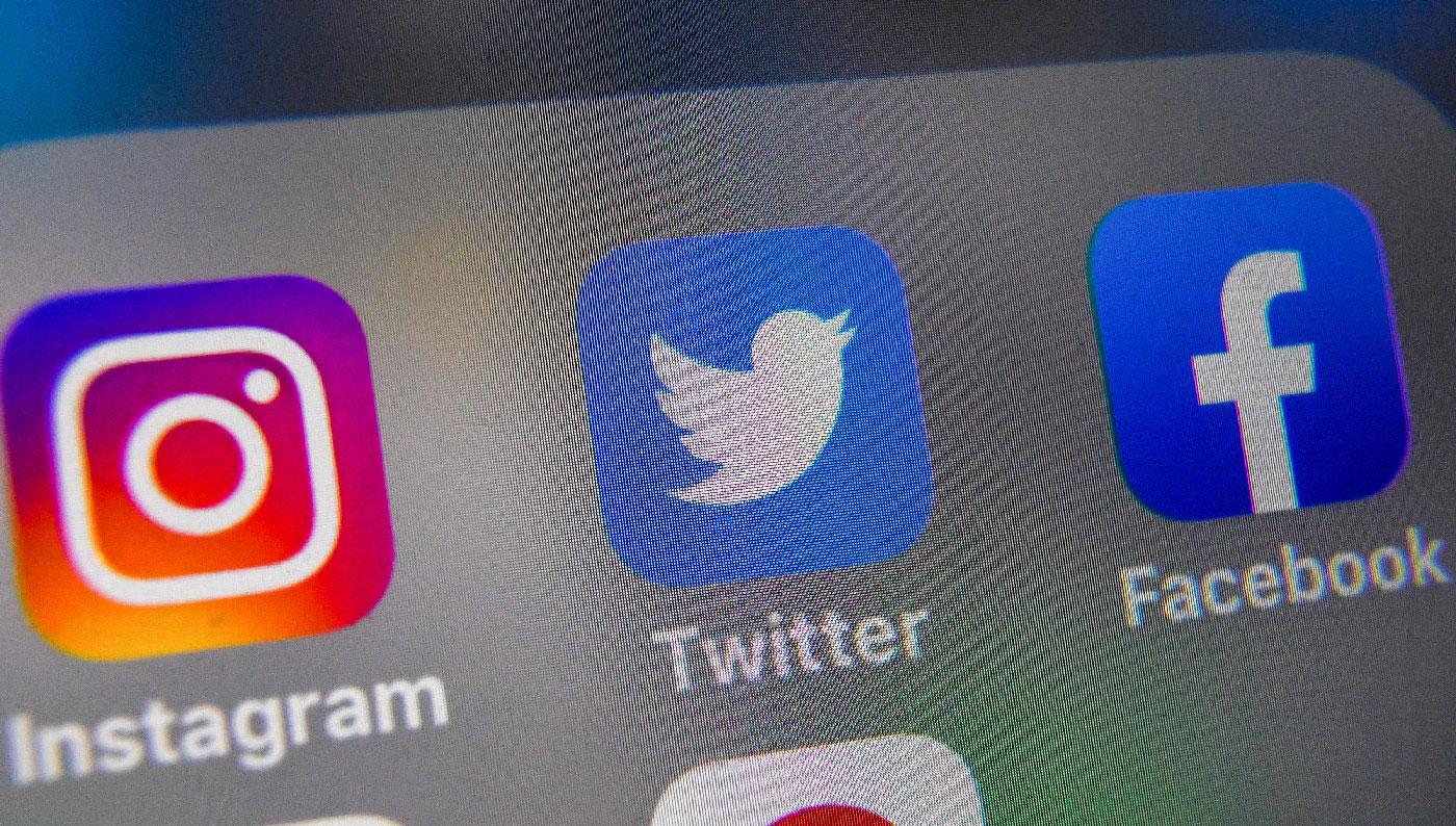 Logos of US social networking websites Instagram, Twitter and Facebook