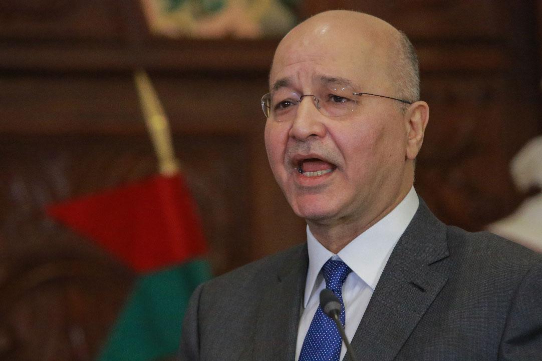 Iraqi President Barham Salih speaks during a press conference