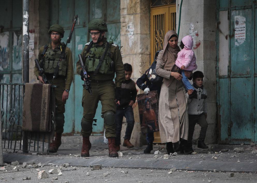 Israeli soldiers deploy in the occupied Palestinian city of Hebron, West Bank