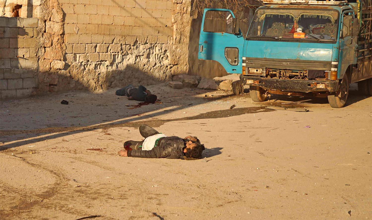  Two bodies following a reported barrel bomb attack by Syrian government forces on the village of Kafr Nuran in the northern province of Aleppo