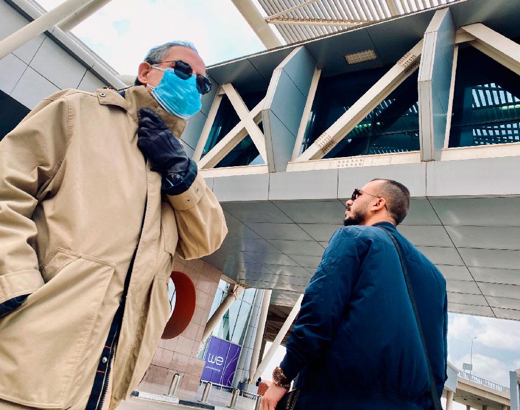 A man waits for arrivals outside the Cairo International Airport