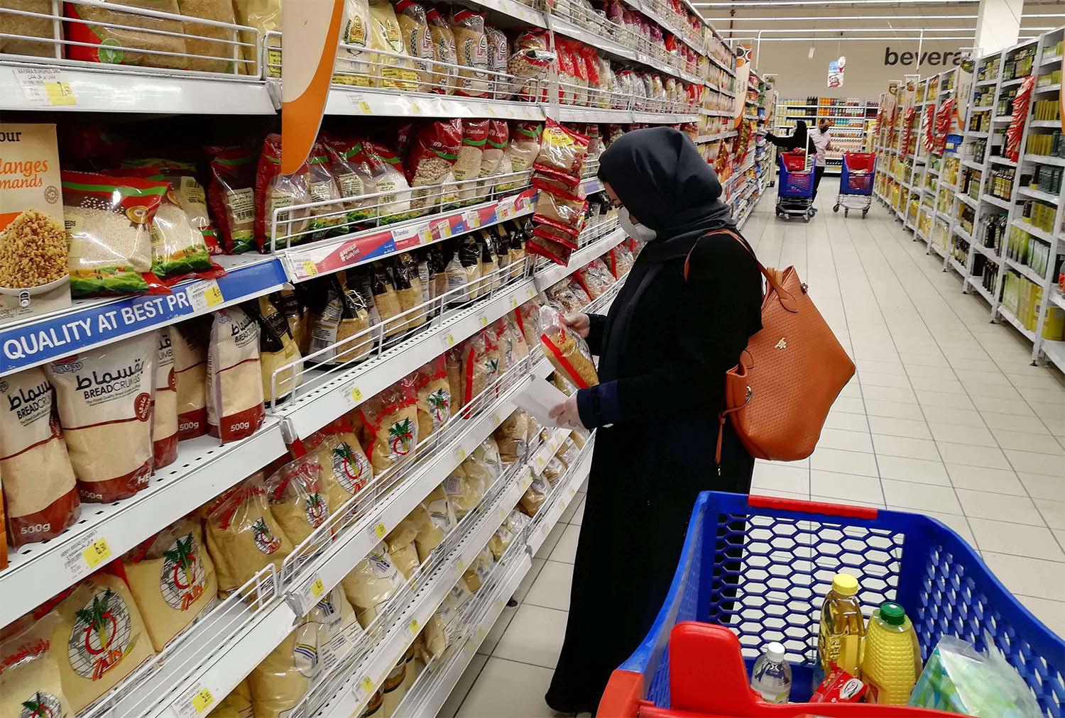 people shopping at a supermarket in the Saudi capital Riyadh
