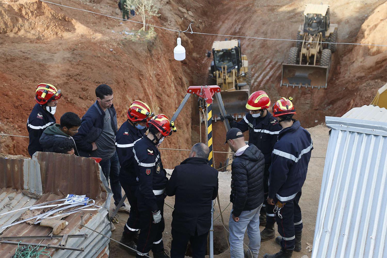 Rescue workers used five bulldozers to dig a hole parallel to the well in an attempt to reach Rayan