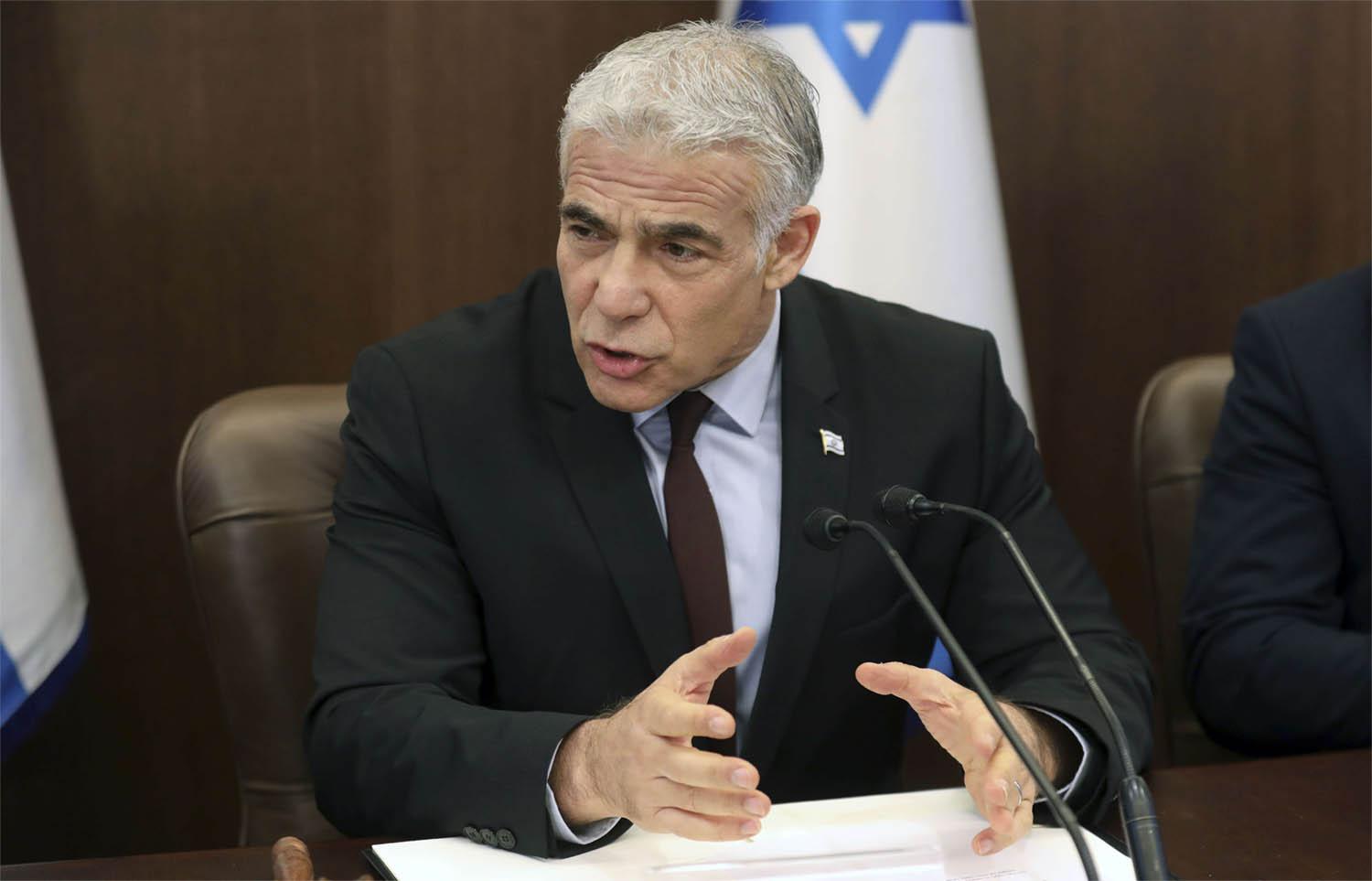 Lapid: We want an end to the unending talks