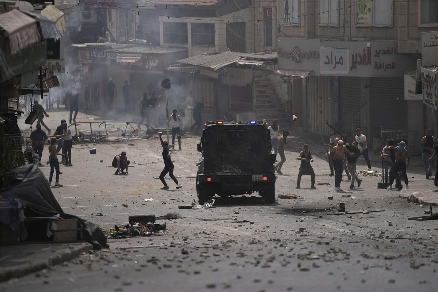 The clashes erupted in Nablus after an arrest raid by Palestinian security against local militants