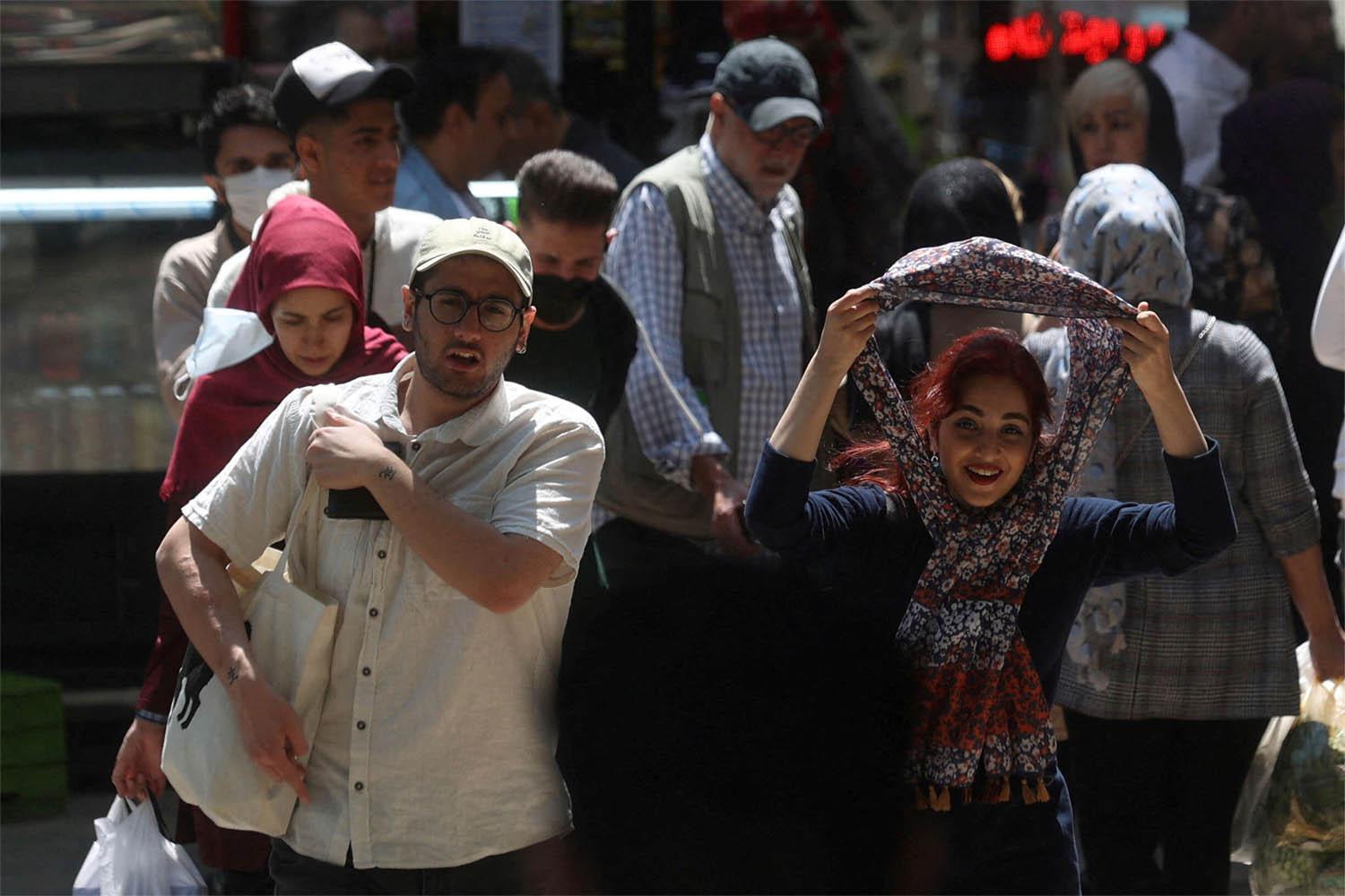 Iran adopts less obtrusive ways to enforce hijab