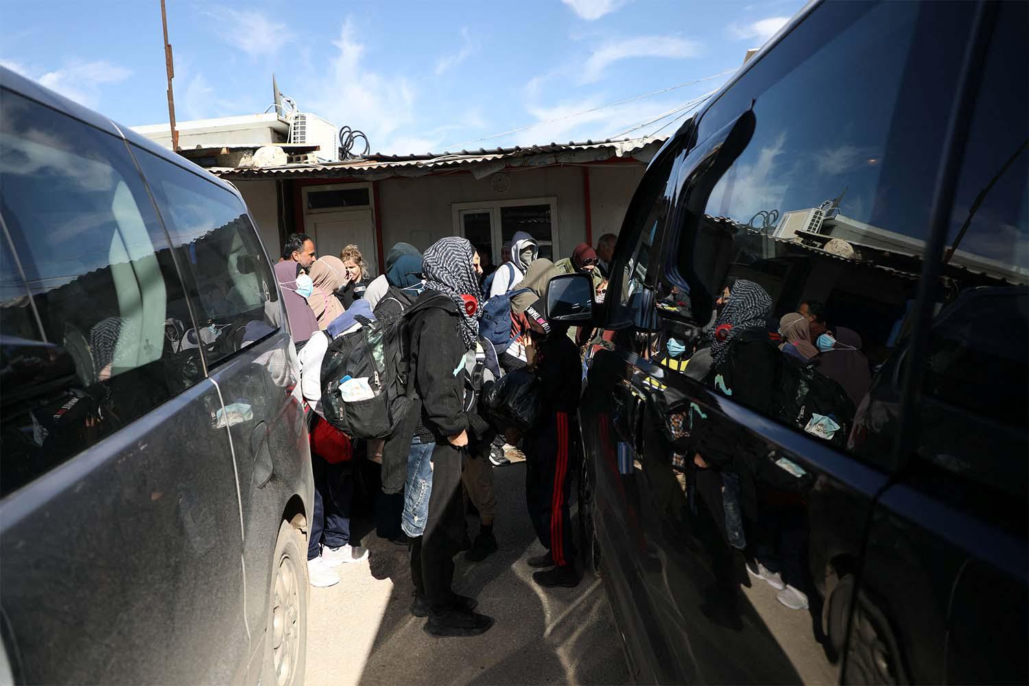 The Australian prisoners boarding the bus