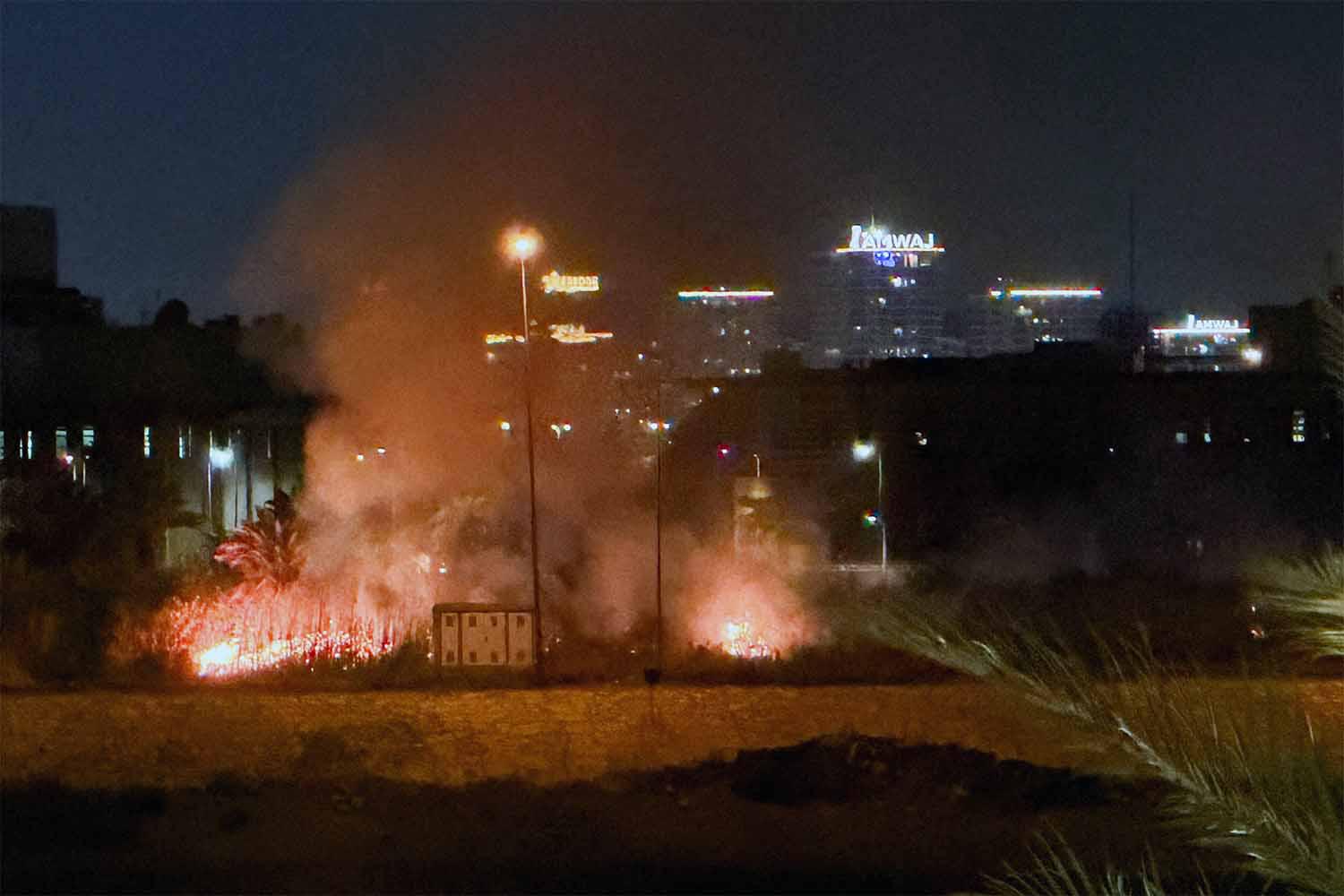 Smoke rises after an explosion at the US Embassy compound in Baghdad
