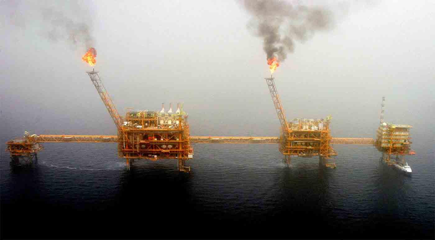  Gas flares from an oil production platform at the Soroush oil fields in the Persian Gulf, south of Tehran